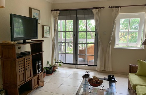 Rendezvous Condo | One-bedroom 15 minute walk to white sandy beach with shared pool