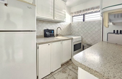 Sunset Crest Apartment | Poolside condo with garden access direct to beach!