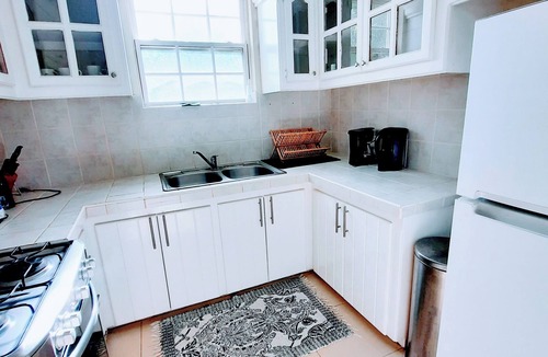 St. Lawrence Gap Apartment | Private Patio Upstairs Condo Suite at Mangoville