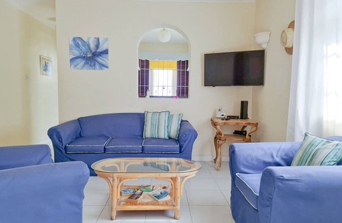 Silver Sands Apartment | Silver Sands Beachfront Condo, Indoor & Outdoor Dining, Shared Patio - Bar & BBQ