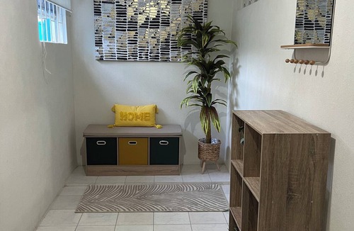 Below Rock Apartment | South Coast Vibes – 2 Bedroom, 1 Bathroom Self-Contained Basement Apartment