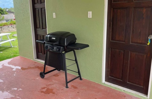 Clermont House | Spacious 3BR home with patio and parking.