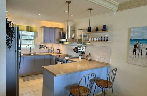 St. Lawrence Gap Condo | SWAYING PALMS, BEACHES, DINING, BARS, & ENTERTAINMENT, JUST OUTSIDE OUR GATES!