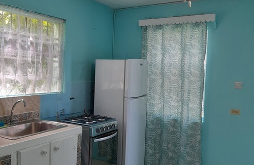 Maynards Apartment | Tropical Blossom Apt. with washer, T.V, a/c,wi-fi
