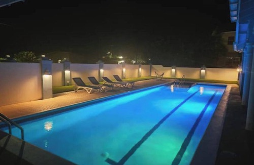 Oistins House | Walham Estates & Villas—5-bedroom, 5-bathroom with a pool and gym.