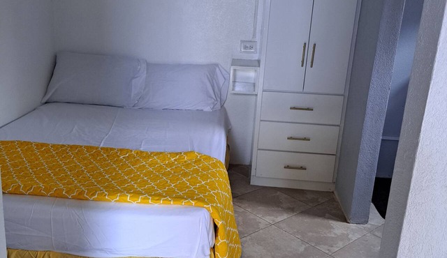 Cozy 1-bedroom bed & breakfast in a pleasant location with AC in Bridgetown