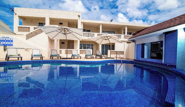 Poolside Stay w/Private Patio Near the Beach in Oistins