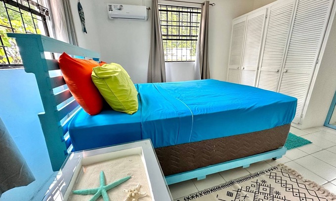 Oistins Apartment | At Ease On The Beach