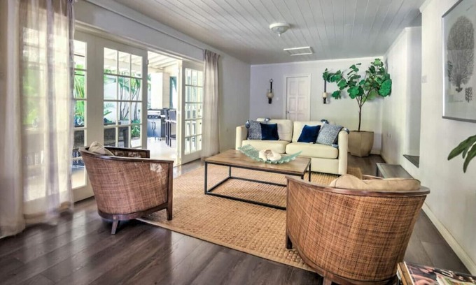 Douglas House | Capri Manor, Young Estates · Stunning Luxury Beachfront Villa
