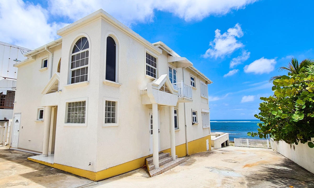 Silver Sands Apartment | Silver Sands Beachfront Condo, Indoor & Outdoor Dining, Shared Patio - Bar & BBQ