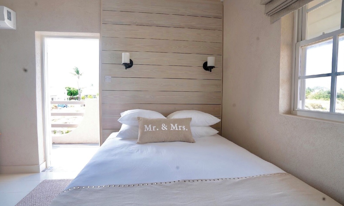 Oistins Apartment | Ocean facing spacious One Bedroom Apt two minutes walk to the beach