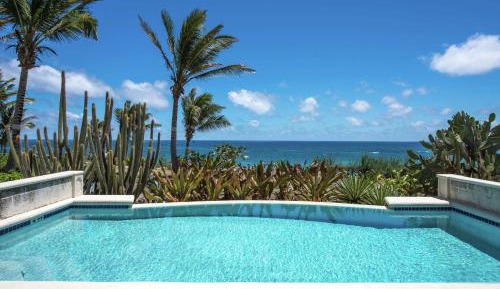 One-Bedroom King Suite with Ocean View and Pool