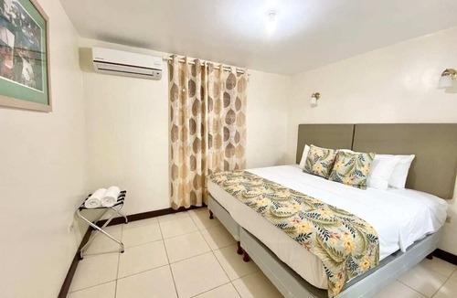 Oistins Condo | Penthouse Apartments. Near BEACH + FAST WIFI