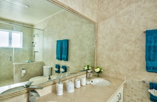 Douglas House | Capri Manor, Young Estates · Stunning Luxury Beachfront Villa