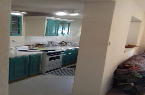 Speightstown Apartment | West coast apartment near beach and marina's. Below lovely family house