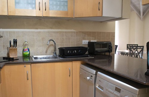 Blue Waters Condo | Ideally located condo with a pool