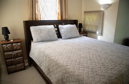 Blue Waters Condo | Ideally located condo with a pool