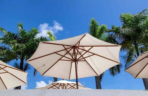 Blue Waters Hotel | Beach Break in Rockley Beach! Two Comfortable Suites, Pool, Free Breakfast!
