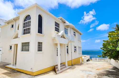 Silver Sands Apartment | Silver Sands Beachfront Condo, Shared Patio - Bar & BBQ, Indoor & Outdoor Dining