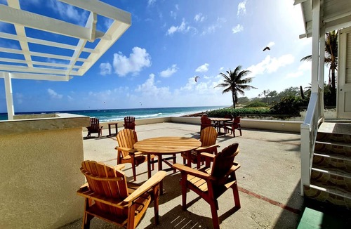 Silver Sands Apartment | Silver Sands Beachfront Condo, Indoor & Outdoor Dining, Shared Patio - Bar & BBQ