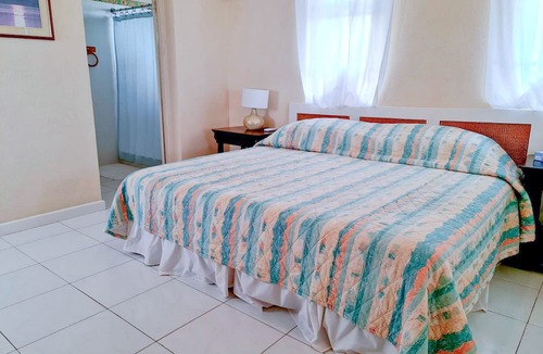 Silver Sands Apartment | Silver Sands Beachfront Condo, Indoor & Outdoor Dining, Shared Patio - Bar & BBQ
