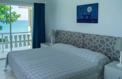 Fitts Village Apartment | Beautiful 2-Bedroom Apartment right on the beach in this tranquil little bay