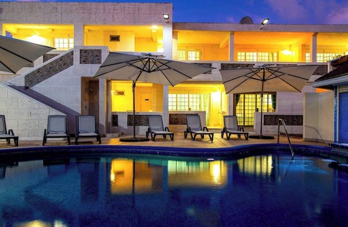 St. Lawrence Gap Condo | Cozy Room with Pool Access, and Modern Amenities
