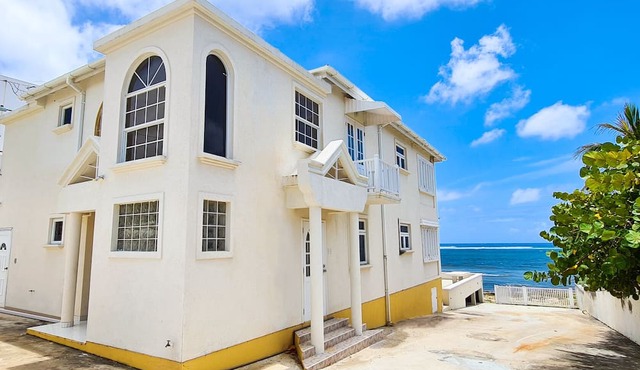 Silver Sands Beachfront Condo, Indoor & Outdoor Dining, Shared Patio - Bar & BBQ in Christ Church