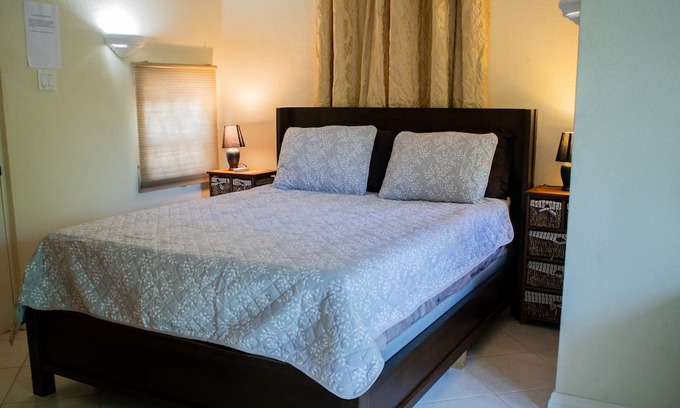 Blue Waters Condo | Ideally located condo with a pool